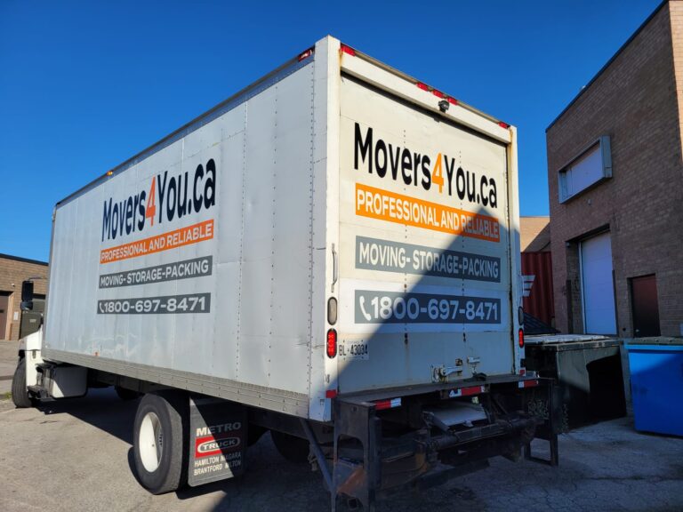 Movers4You moving truck featuring contact information and services: professional, reliable movers for moving, storage, and packing in the Mississauga and surrounding are